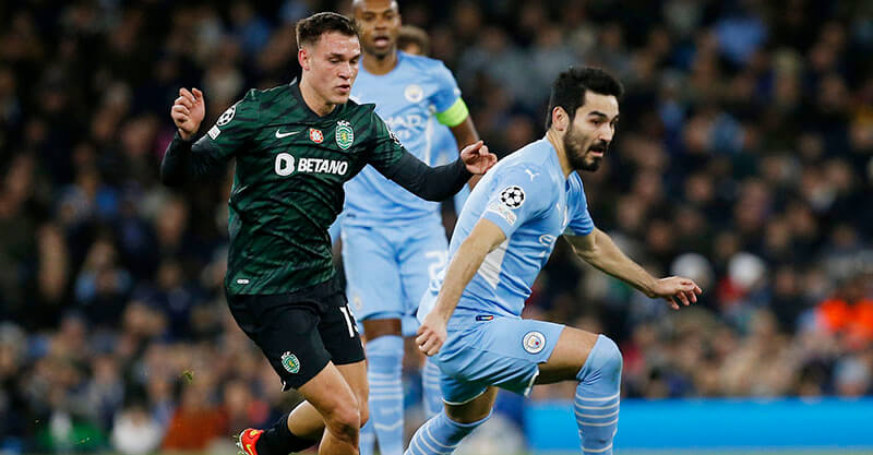 Ugarte e Gundogan em disputa de bola no Manchester City-Sporting