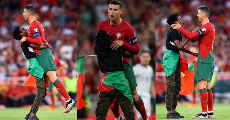 Cristiano Ronaldo e um invasor de campo no Portugal-Bósnia.