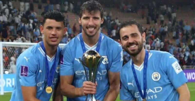 Bernardo Silva, Rúben Dias e Matheus Nunes, jogadores portugueses do Manchester City.