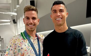 Rui Oliveira ao lado de Cristiano Ronaldo após o Portugal-Escócia.